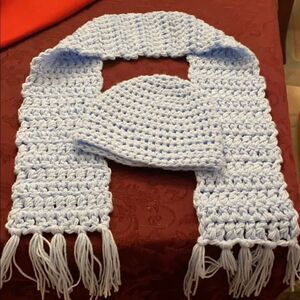 homemade crocheted baby blue hat and scarf set